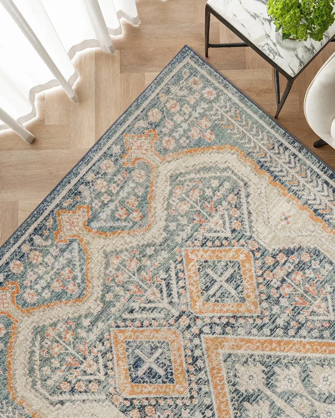Julian Navy carpet in navy, beige, blue and multicolour, shown in a lifestyle top view as image 2