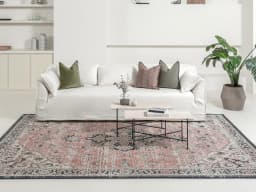 Julian Terracotta carpet in grey and pink, shown in a lifestyle front view