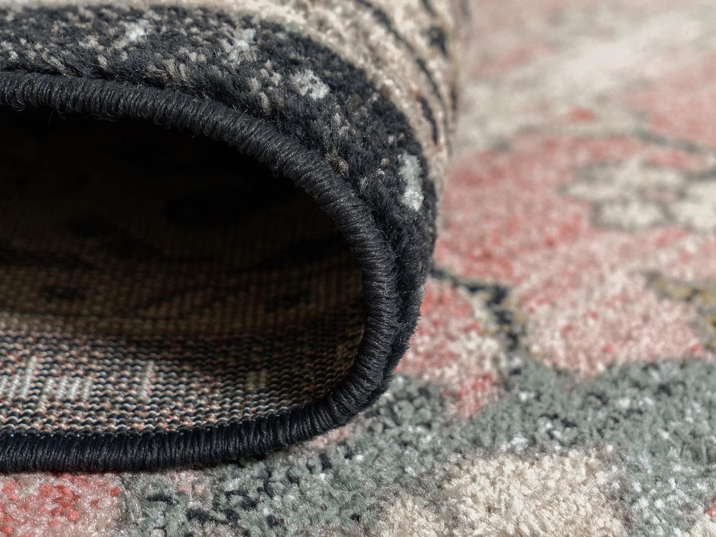 Julian Terracotta carpets in grey and pink, shown in a product close-up as image 2