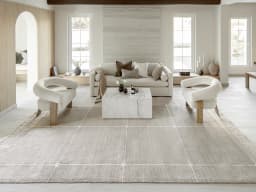 Justin Dune carpet in dune and grey, shown in a lifestyle front view
