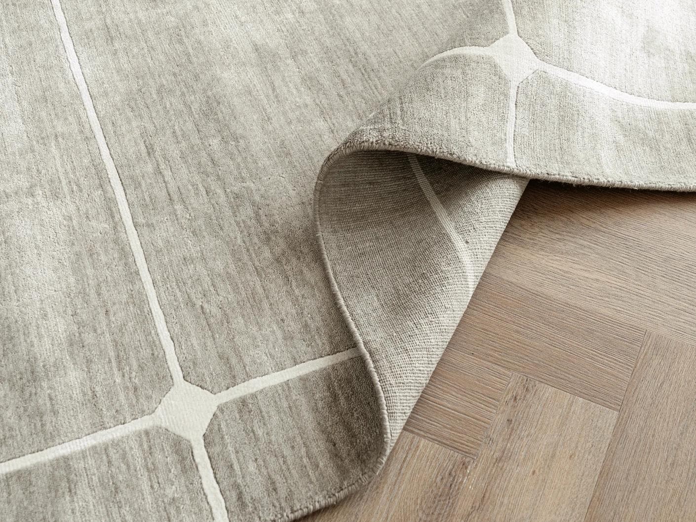 Justin Dune carpets in grey, shown in a product top view as image 1