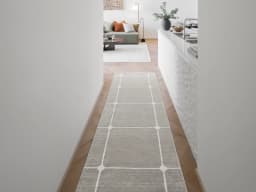 Justin Dune Runners carpet in dune and grey, shown in a lifestyle front view