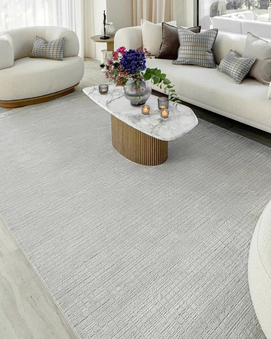 Laino Alba carpet in ivory and grey, shown in a lifestyle top view as image 8