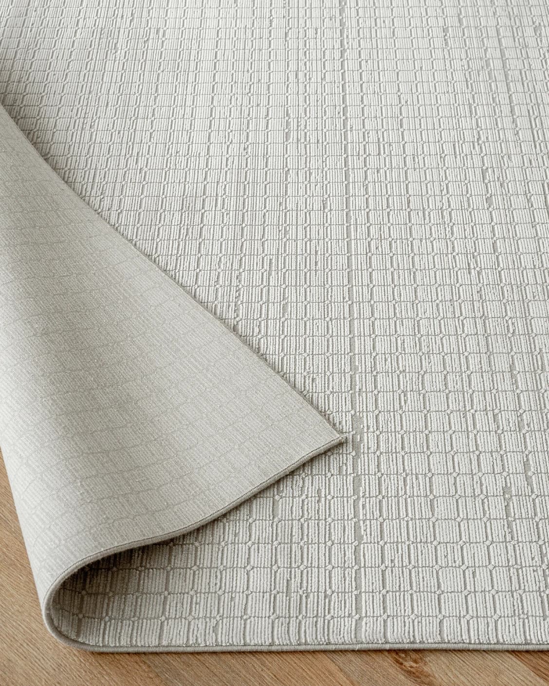 Laino Alba carpet in ivory and grey, shown in a product close-up as image 10