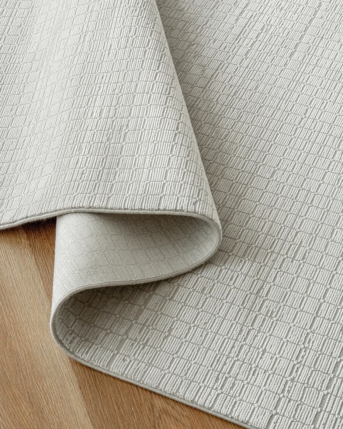 Laino Alba carpet in ivory and grey, shown in a product close-up as image 11