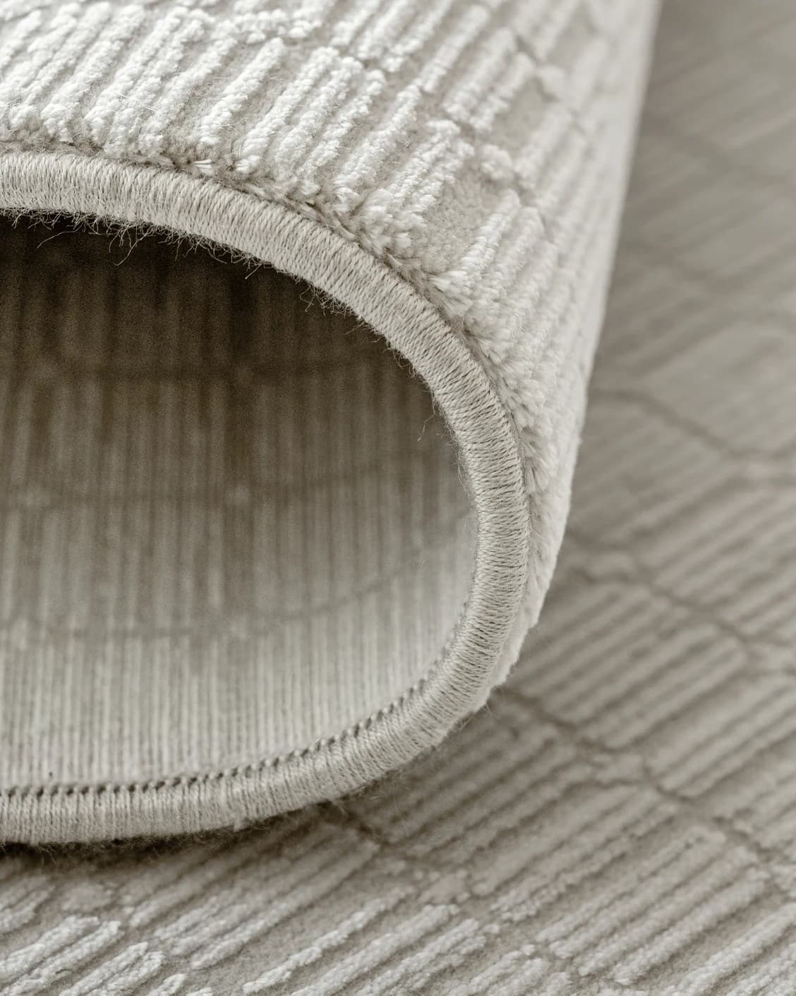 Laino Alba carpet in ivory and grey, shown in a product close-up as image 12