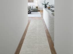 Laino Alba Runners carpet in ivory and grey, shown in a lifestyle front view