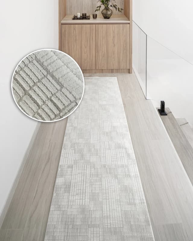 Laino Ashton Runners carpet in ivory and grey, shown in a lifestyle front view