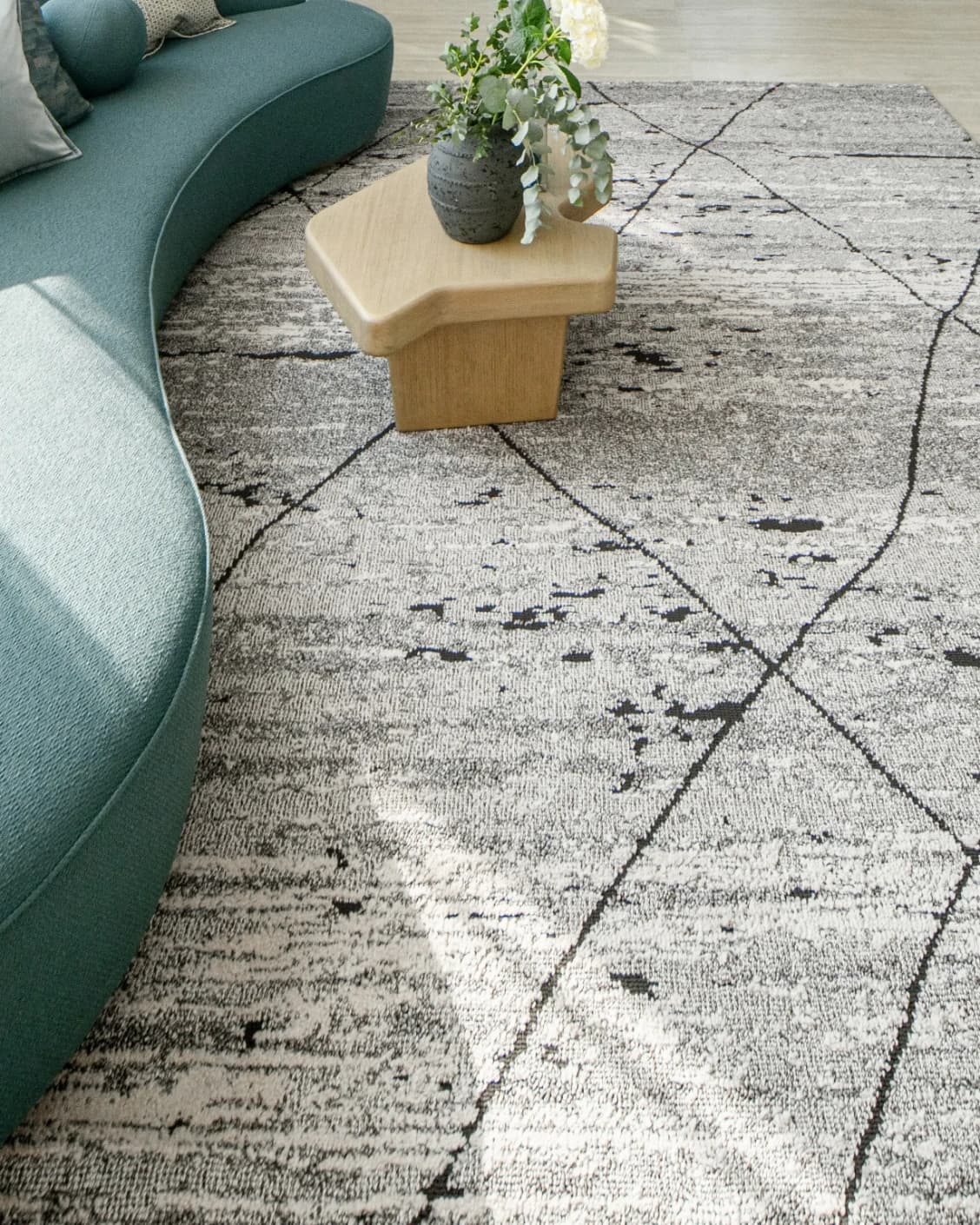 Leila Ashton carpet in charcoal, shown in a lifestyle front view as image 6