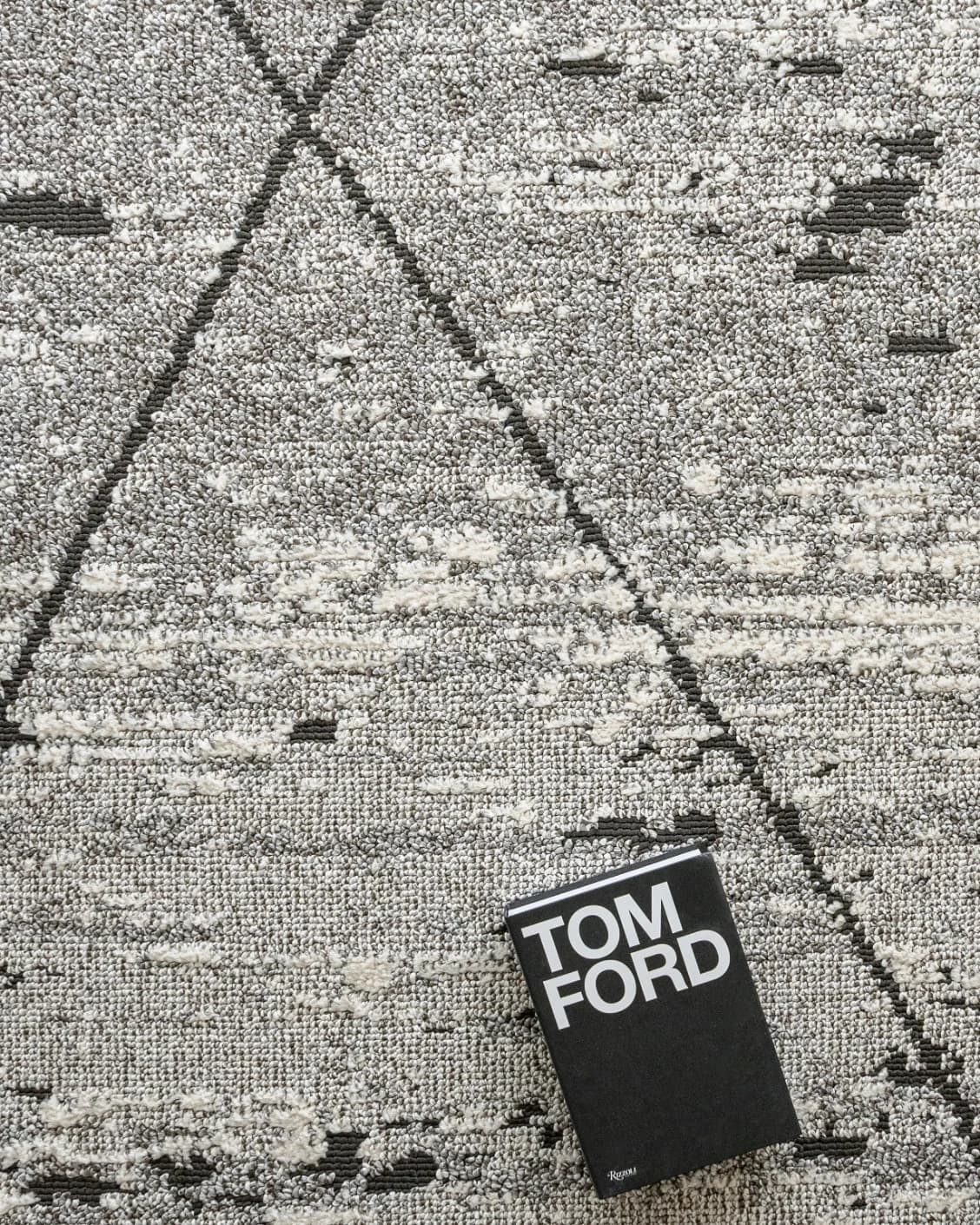 Leila Ashton carpet in charcoal, shown in a lifestyle top view as image 9