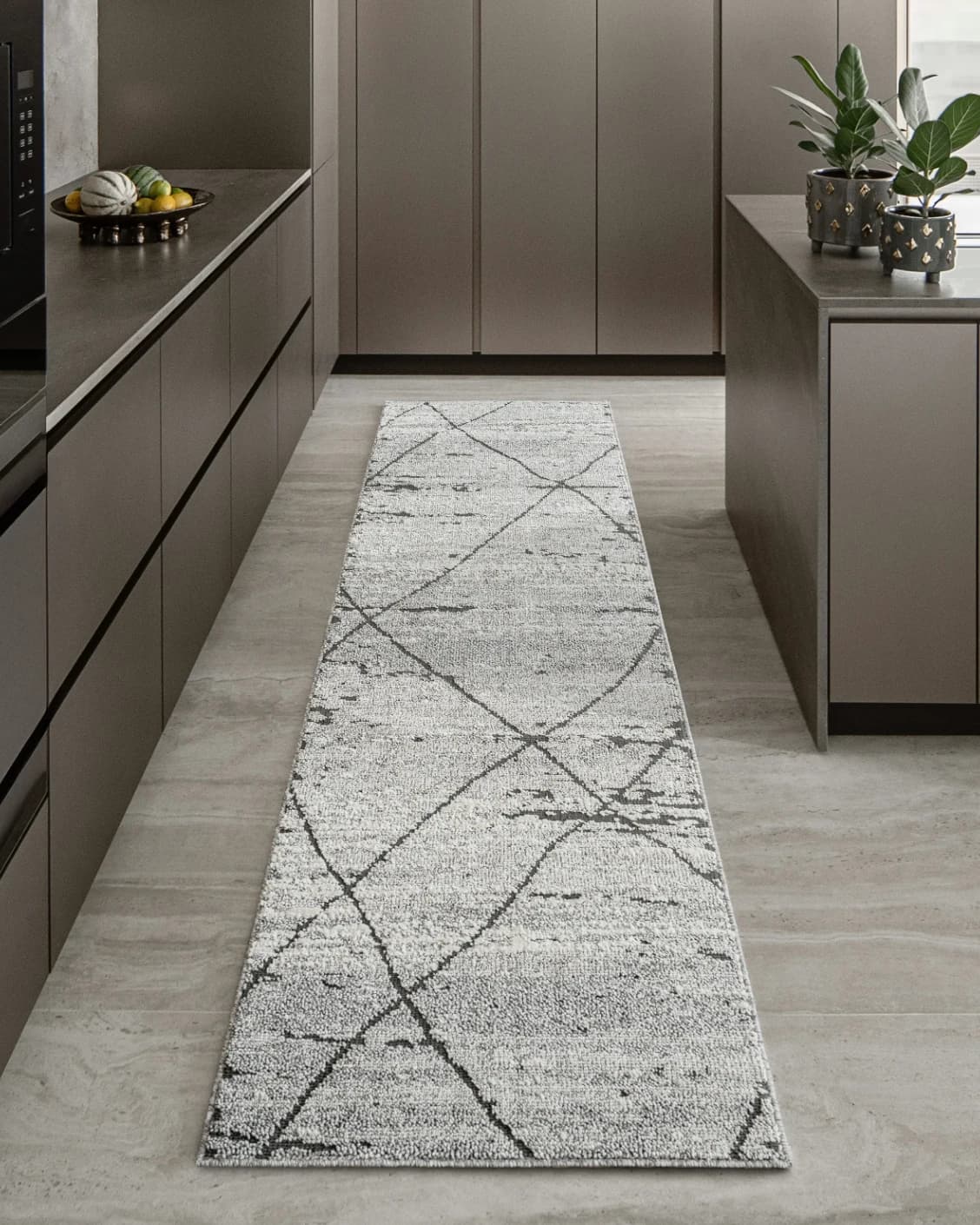 Leila Ashton Runners carpet in charcoal, shown in a lifestyle front view as image 2