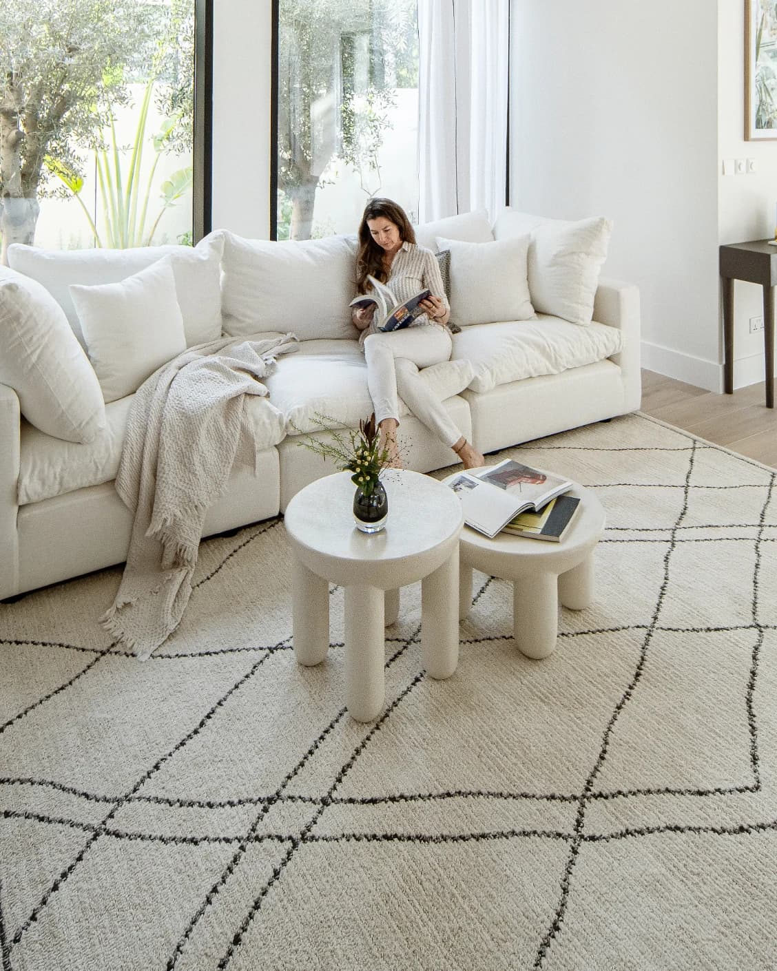 Leila Bianca carpet in beige and charcoal, shown in a lifestyle front view as image 6