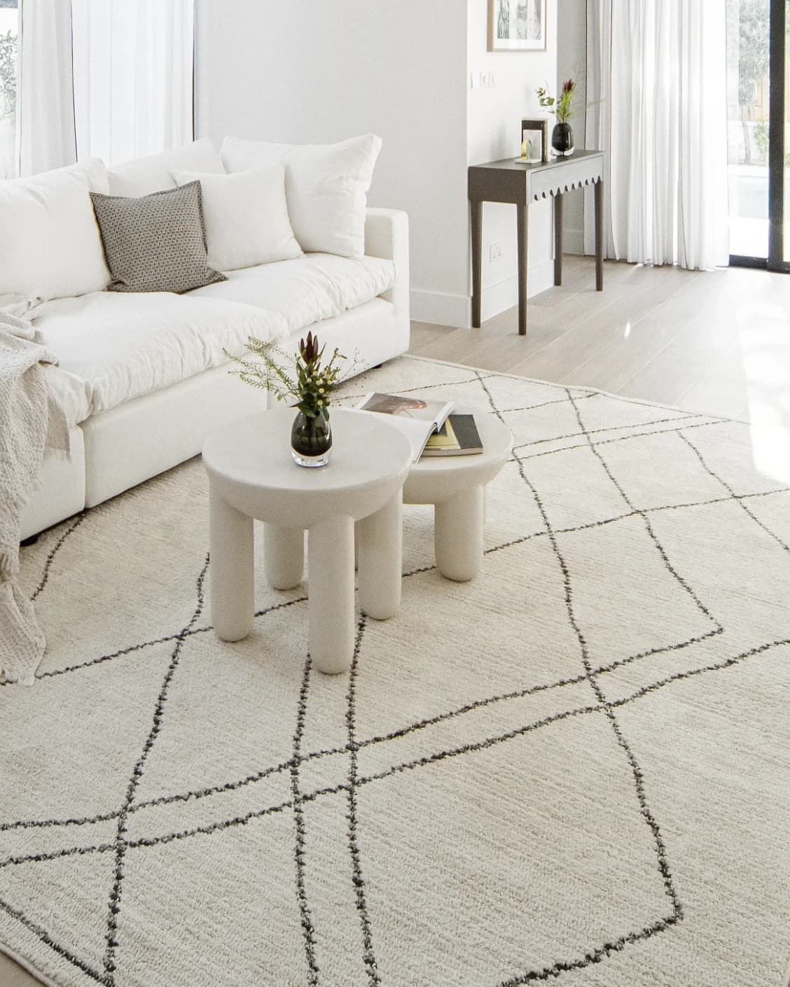 Leila Bianca carpet in beige and charcoal, shown in a lifestyle front view as image 7