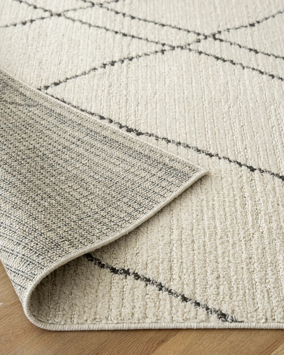 Leila Bianca carpet in beige and charcoal, shown in a product close-up as image 15