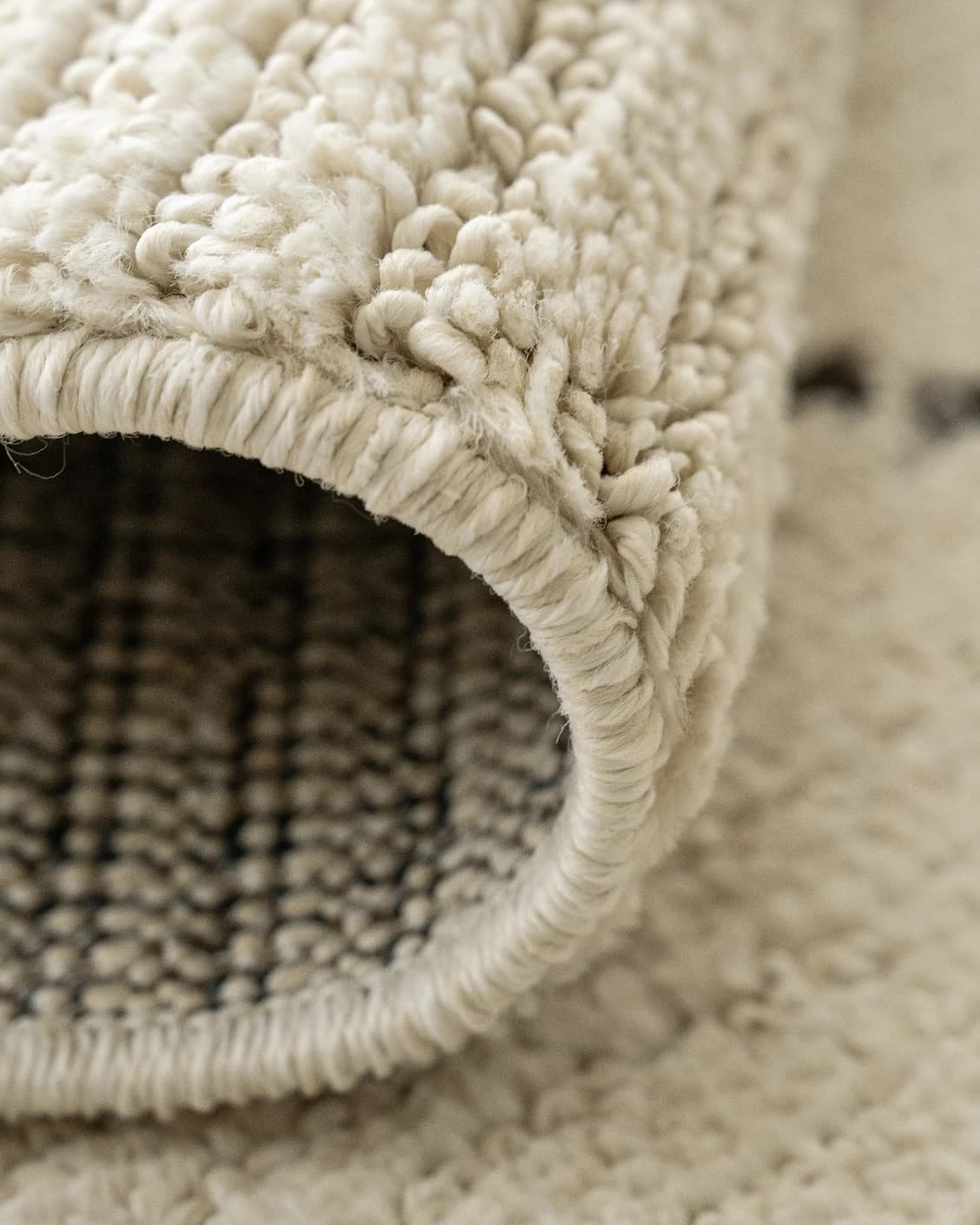 Leila Bianca carpet in beige and charcoal, shown in a product close-up as image 17