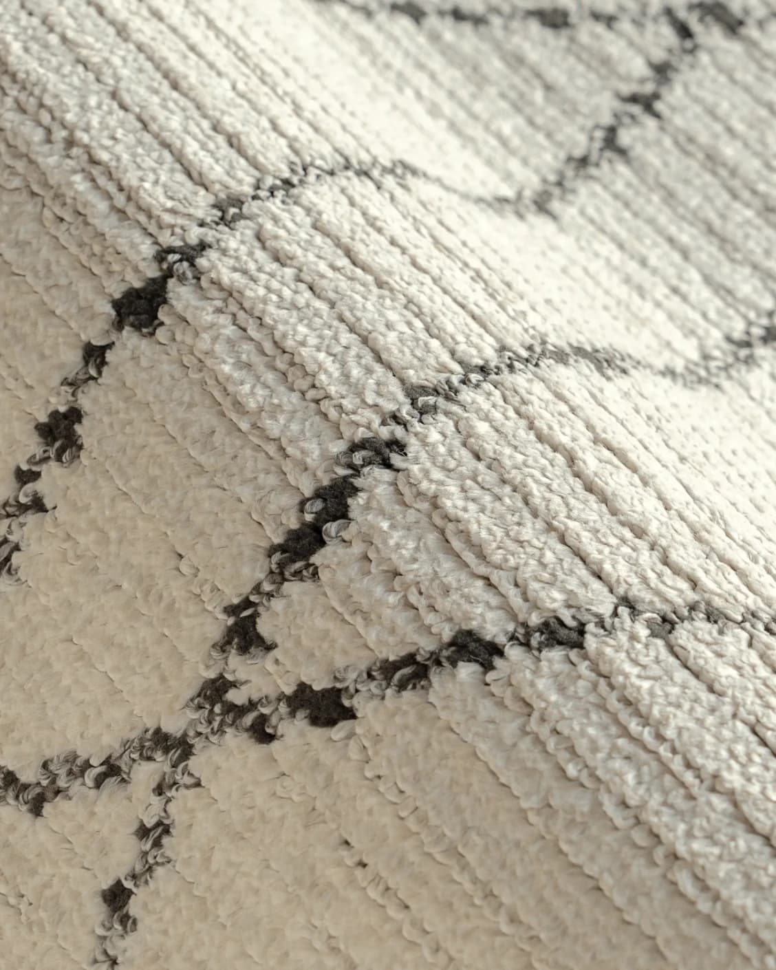 Leila Bianca carpet in beige and charcoal, shown in a product as image 18
