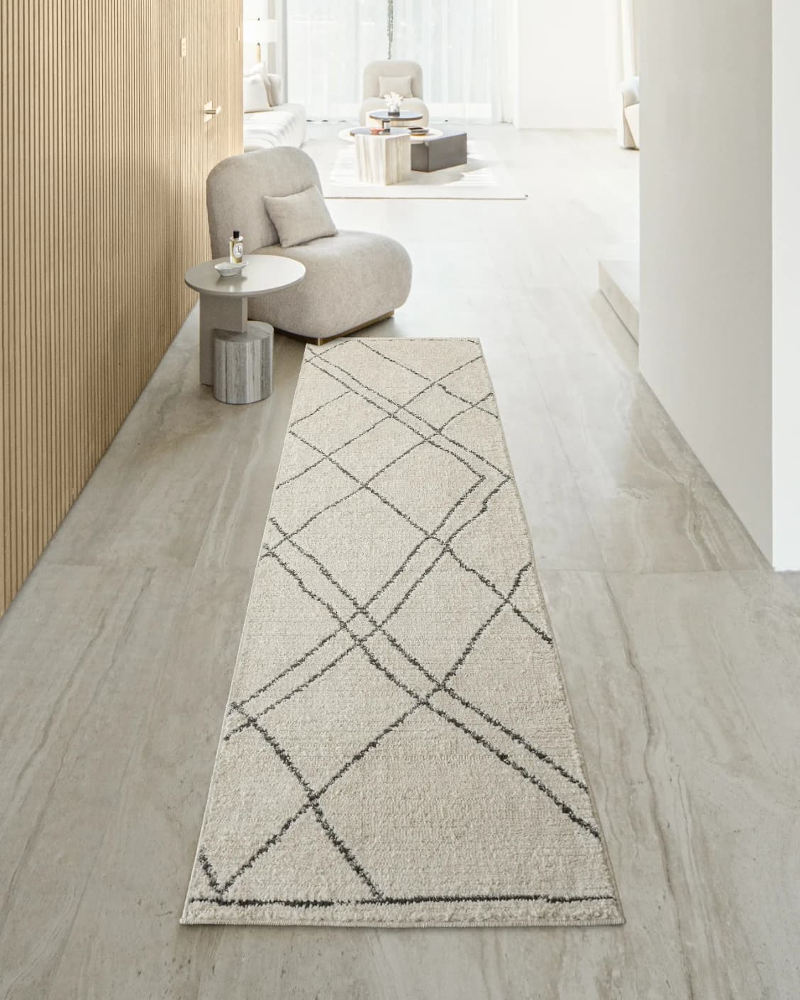 Leila Bianca Runners carpet in beige and charcoal, shown in a lifestyle front view as image 2