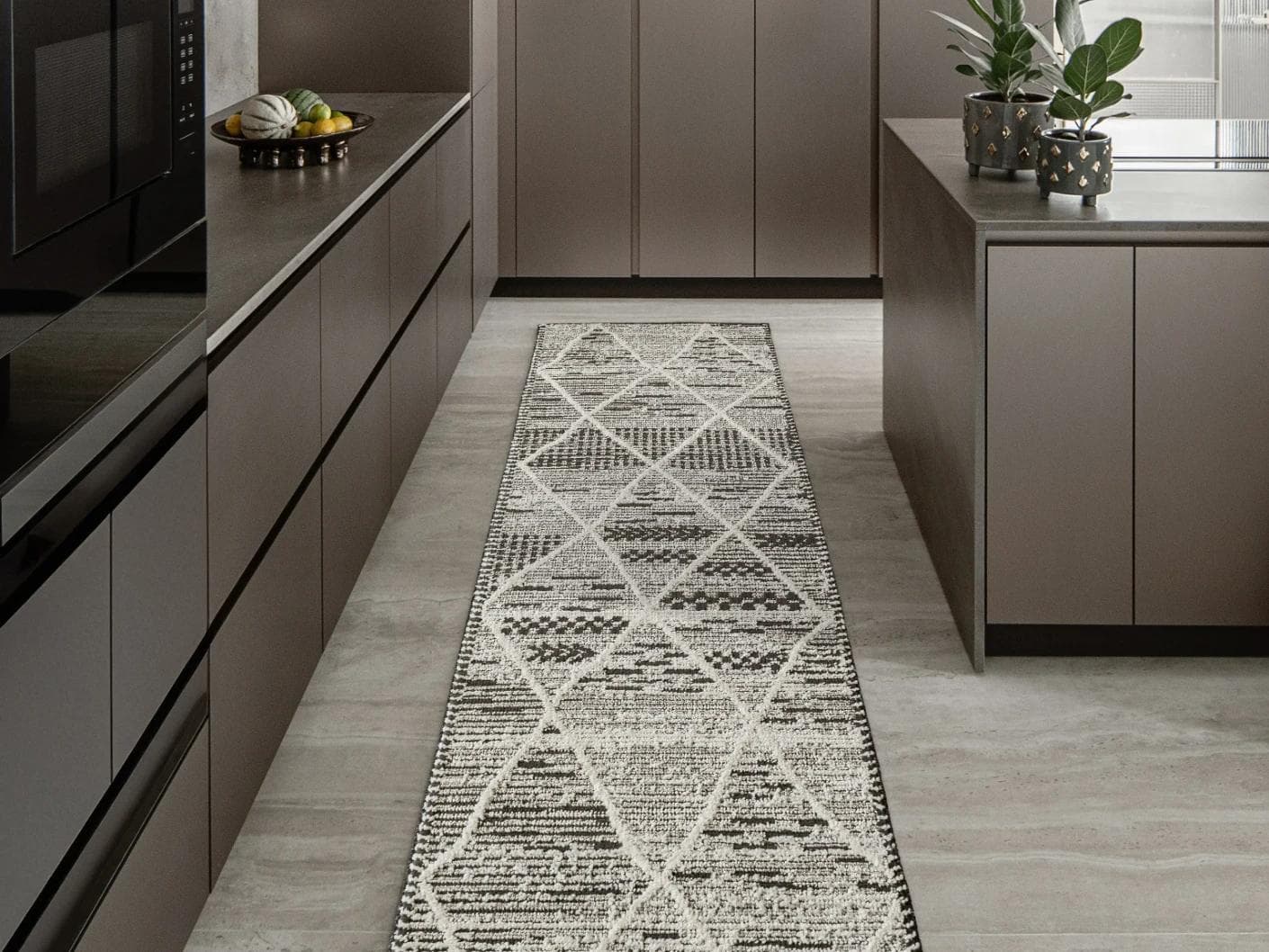 Leila Ebony carpets in charcoal and white, shown in a lifestyle front view as image 1