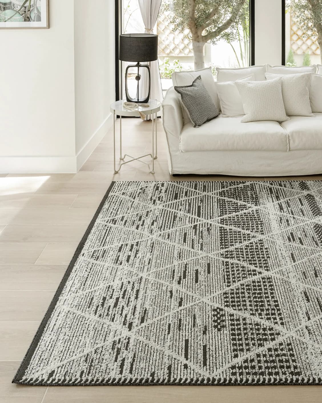 Leila Ebony carpet in charcoal and white, shown in a lifestyle front view as image 7