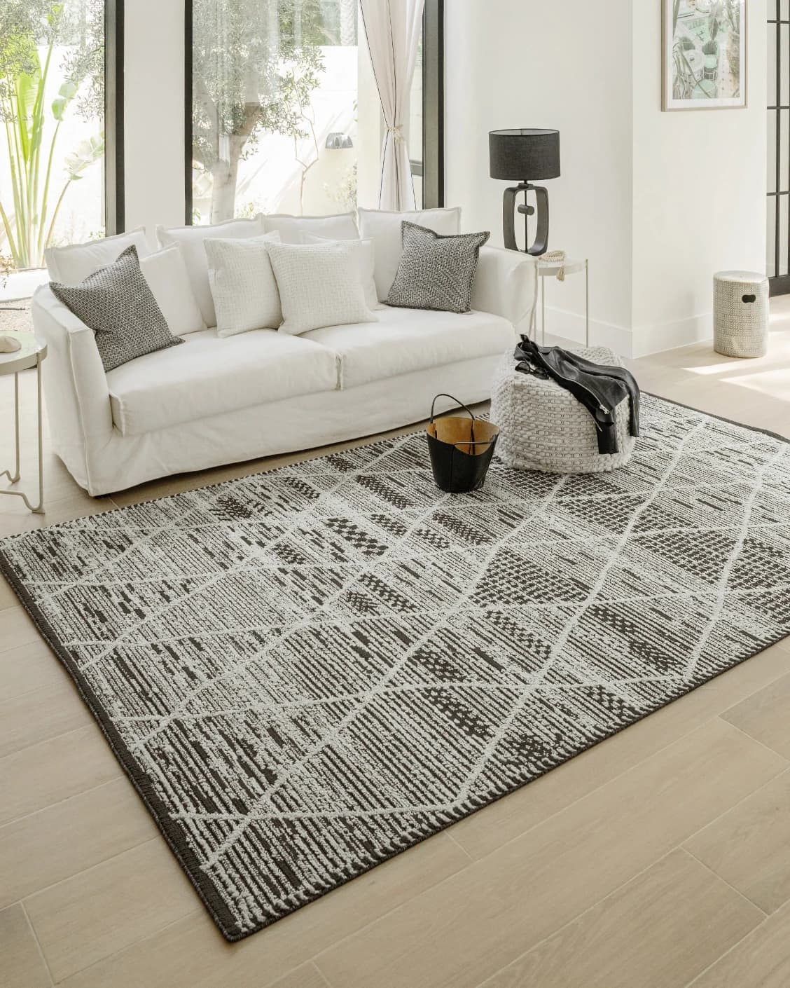 Leila Ebony carpet in charcoal and white, shown in a lifestyle left view as image 9