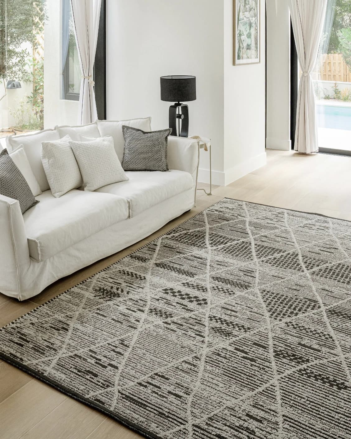 Leila Ebony carpet in charcoal and white, shown in a lifestyle left view as image 10