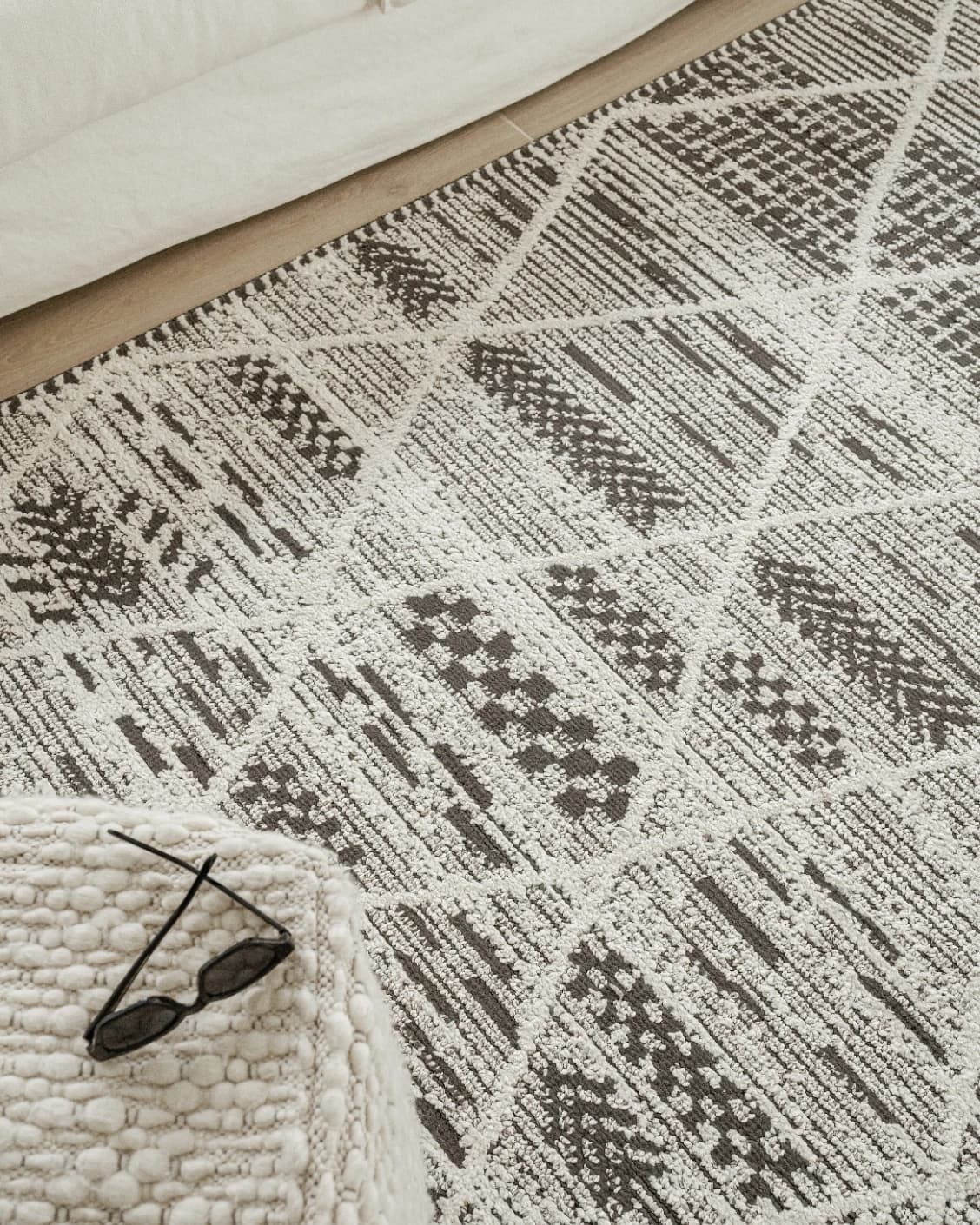 Leila Ebony carpet in charcoal and white, shown in a lifestyle top view as image 12