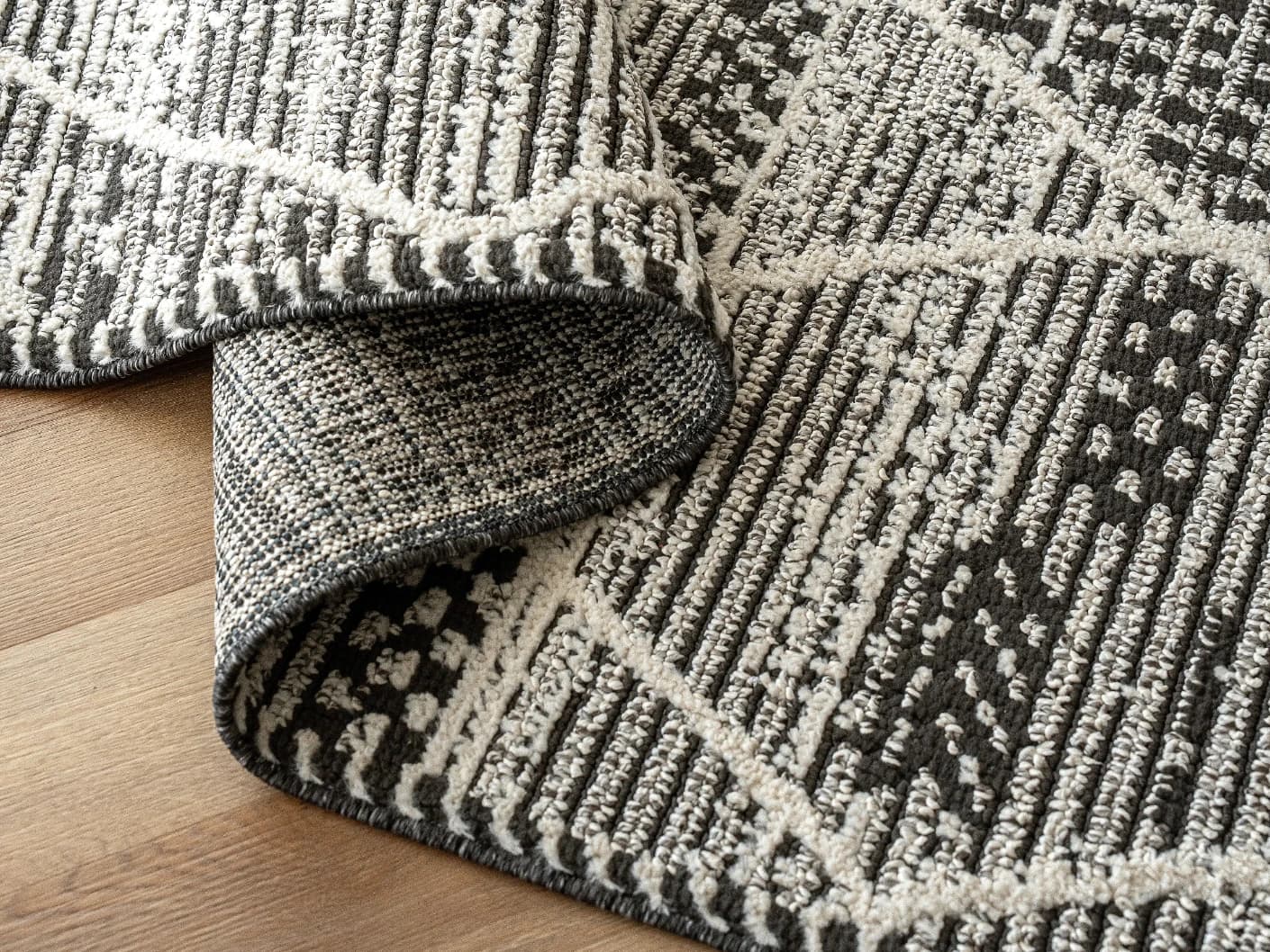 Leila Ebony carpets in ebony, charcoal and white, shown in a product close-up view