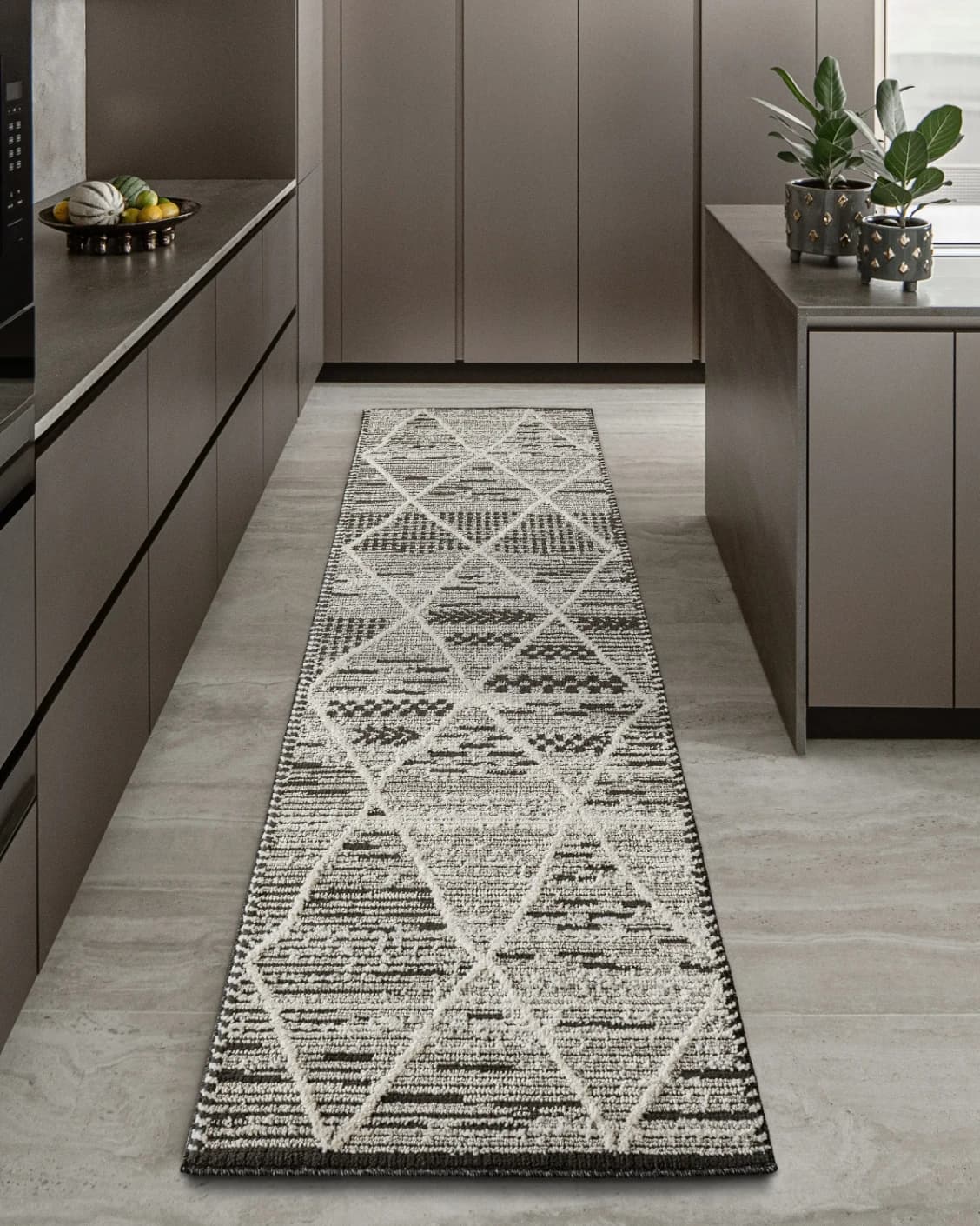 Leila Ebony Runners carpet in ebony, charcoal and white, shown in a lifestyle front view as image 2