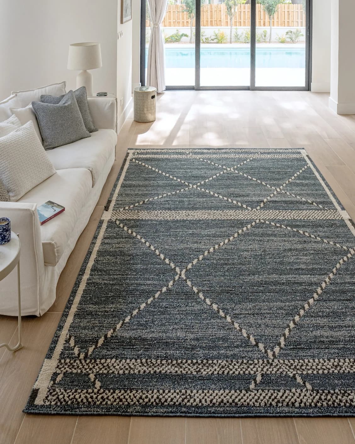 Leila Sky carpet in blue, shown in a lifestyle front view as image 4
