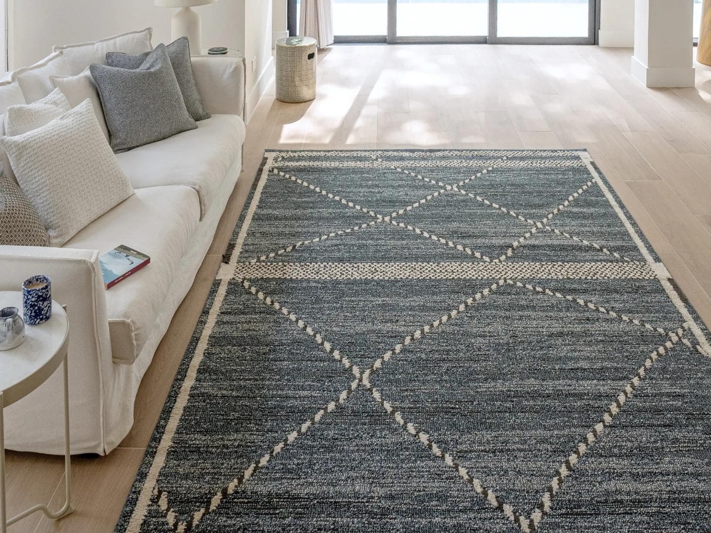 Leila Sky carpet in blue, shown in a lifestyle front view as image 4