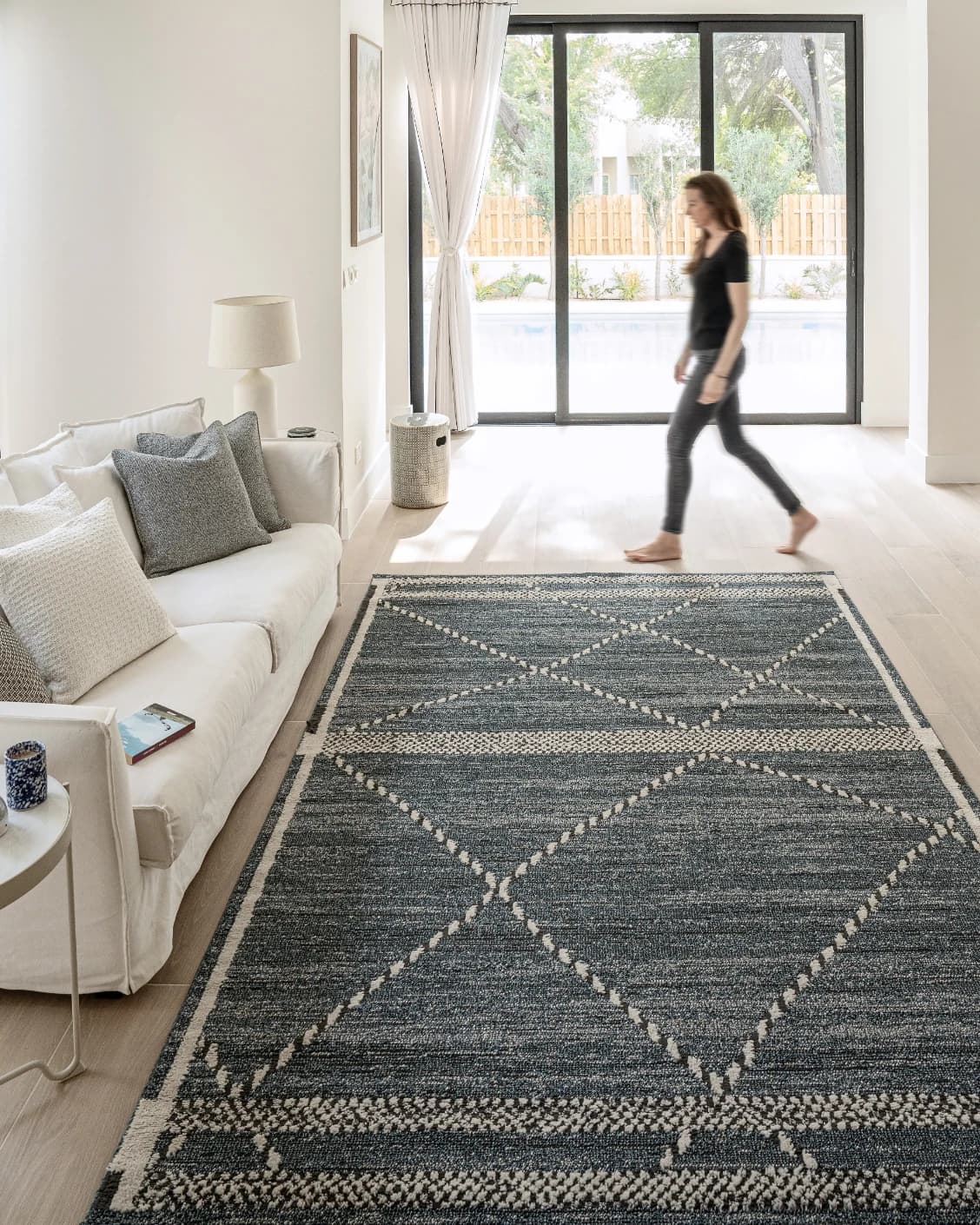 Leila Sky carpet in blue, shown in a lifestyle front view as image 5
