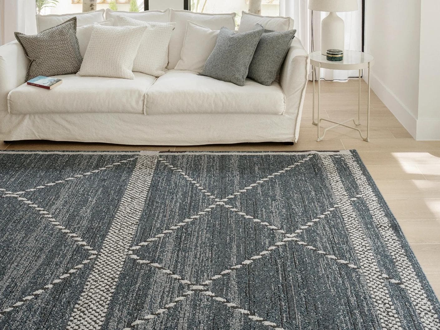 Leila Sky carpet in blue, shown in a lifestyle front view as image 6