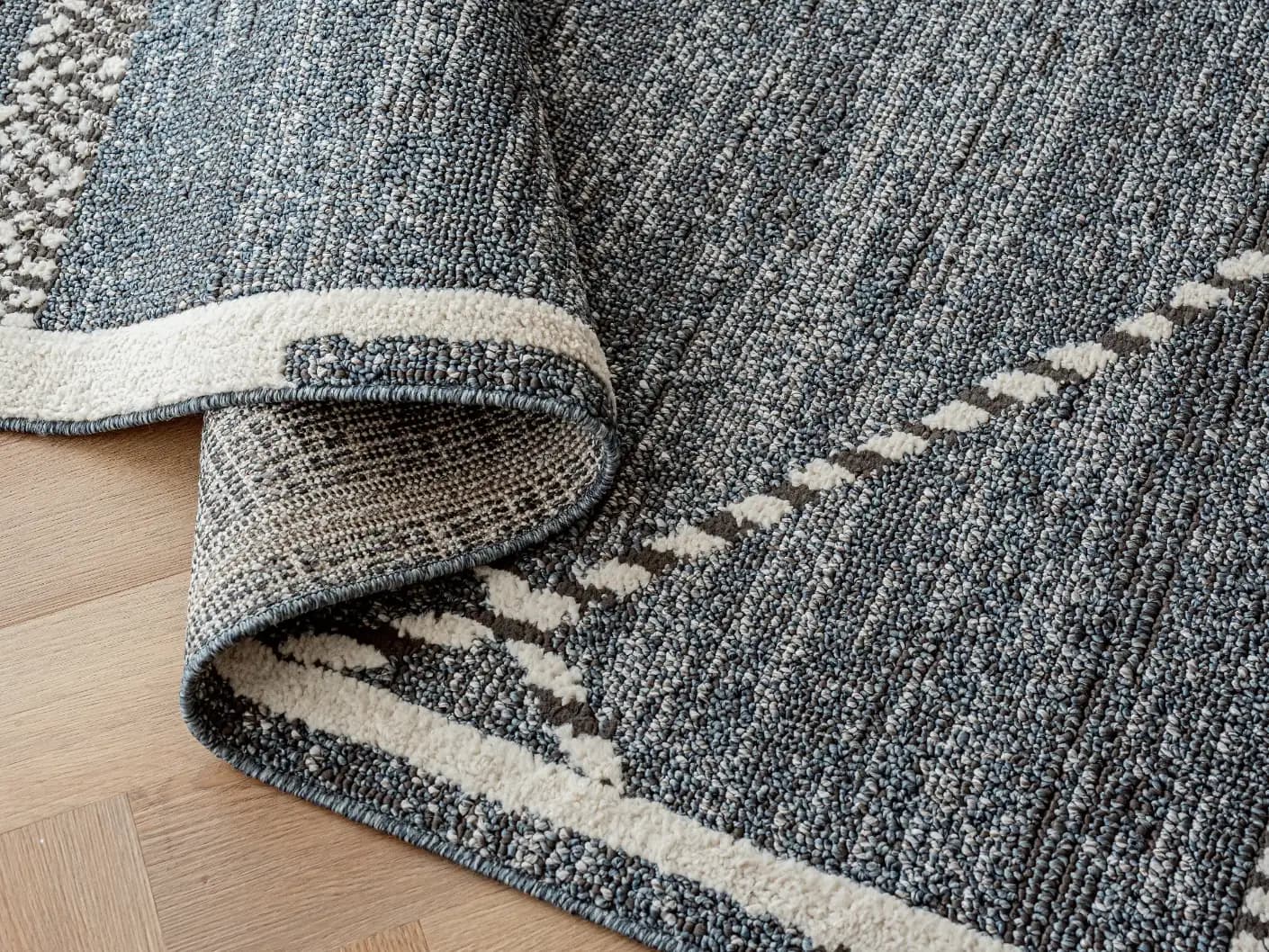 Leila Sky carpets in sky and blue, shown in a product close-up view