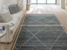 Leila Sky carpet in sky and blue, shown in a lifestyle front view