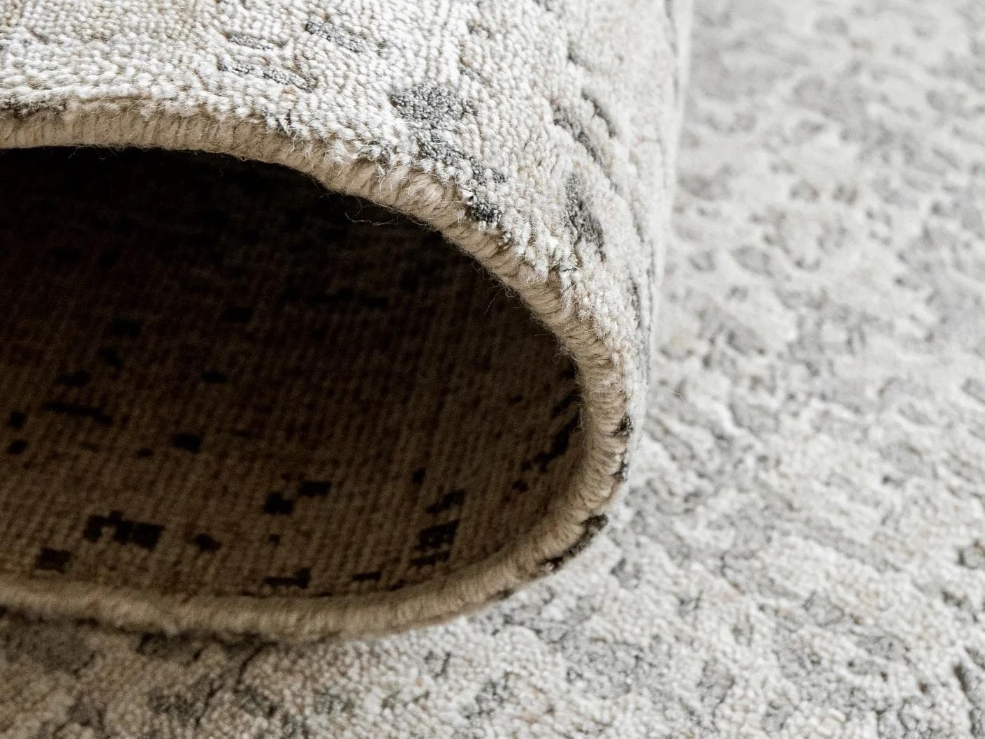 Liam Alba carpet in grey, shown in a lifestyle close-up as image 4