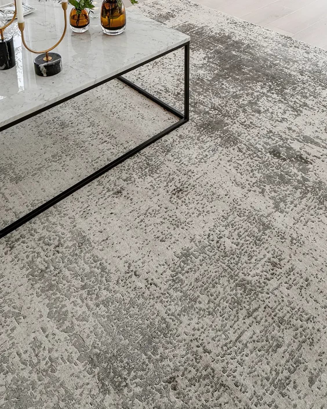 Liam Alba carpet in grey, shown in a lifestyle top view as image 12