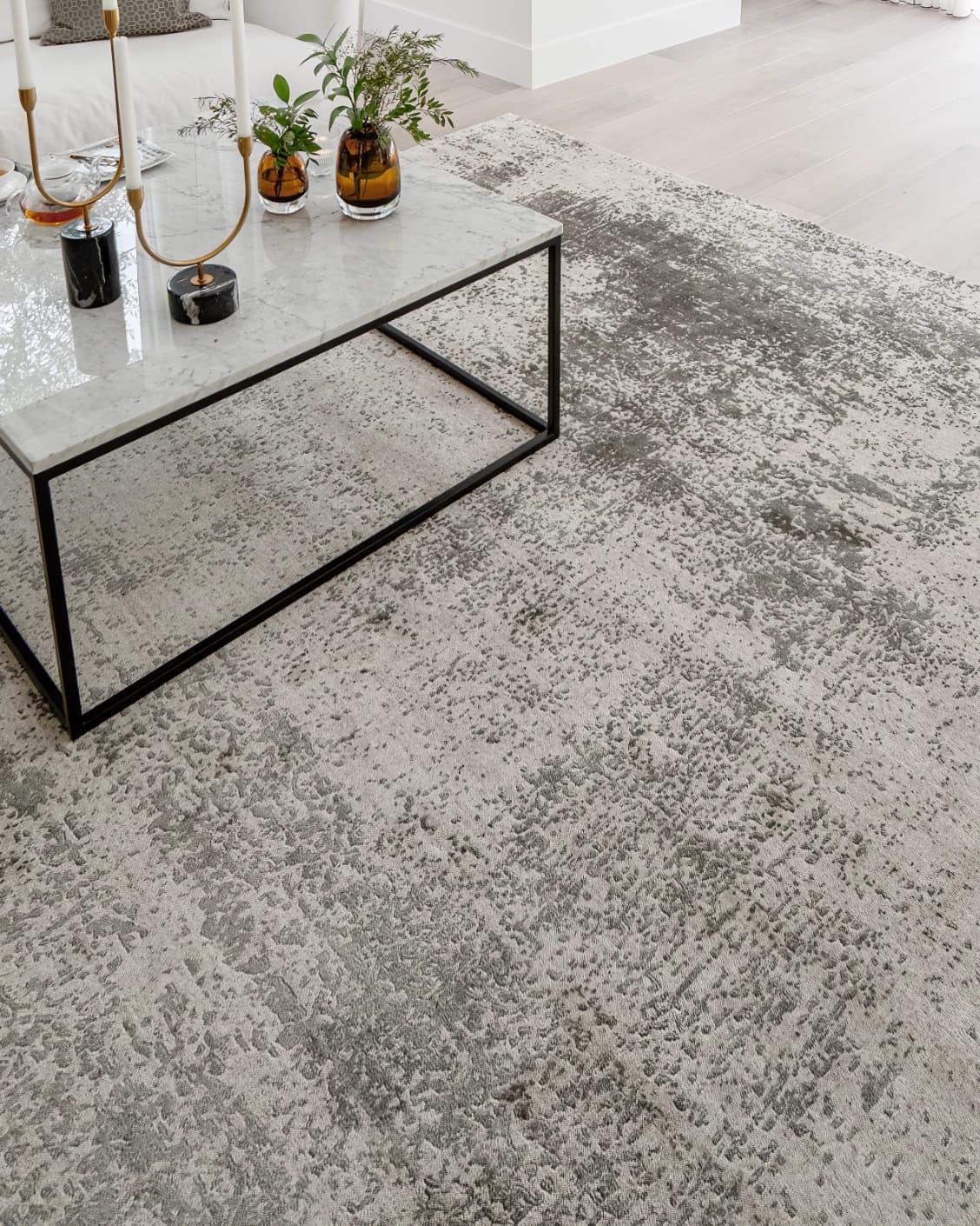 Liam Alba carpet in grey, shown in a lifestyle top view as image 13