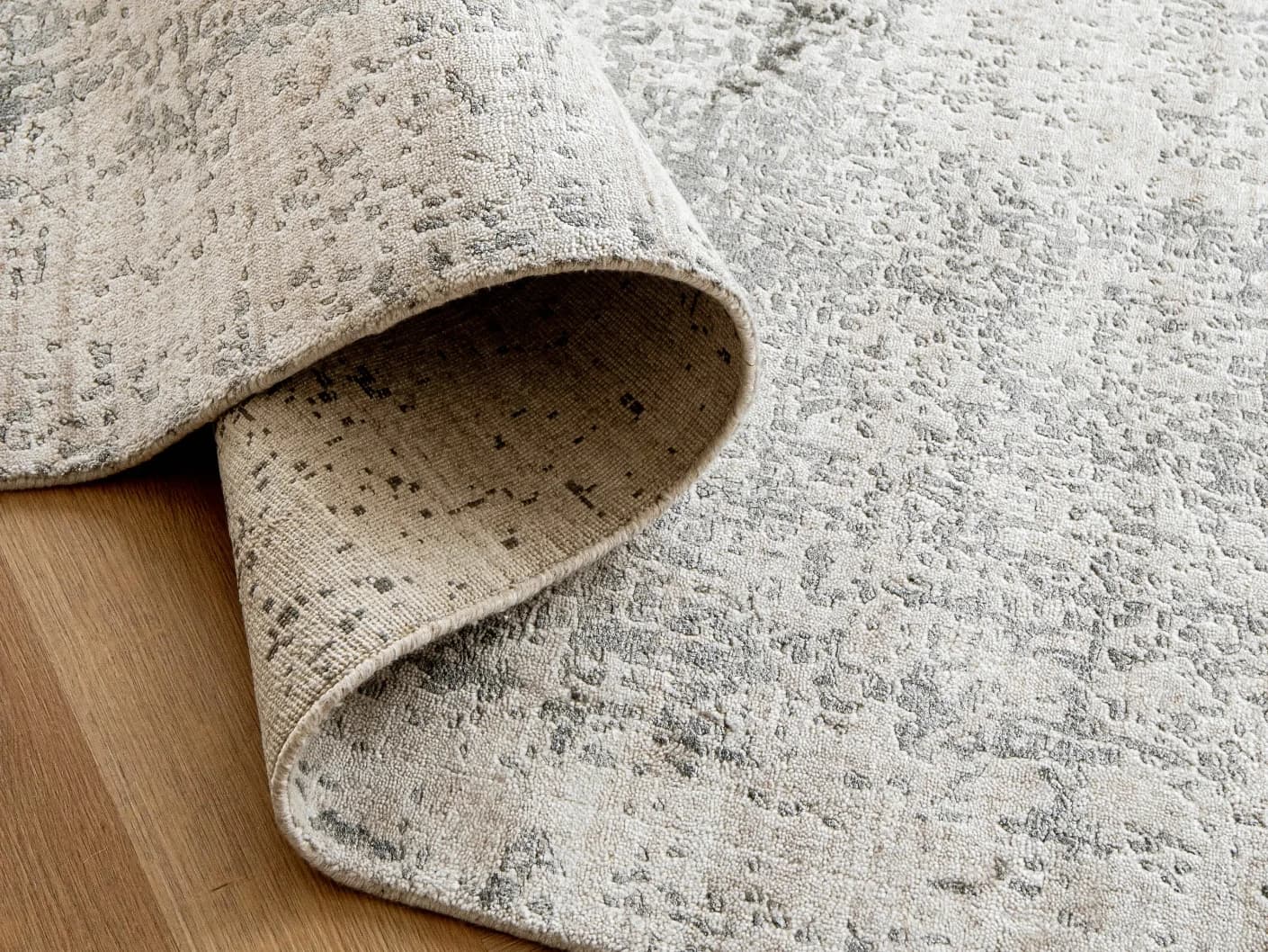 Liam Alba carpets in grey, shown in a product close-up view