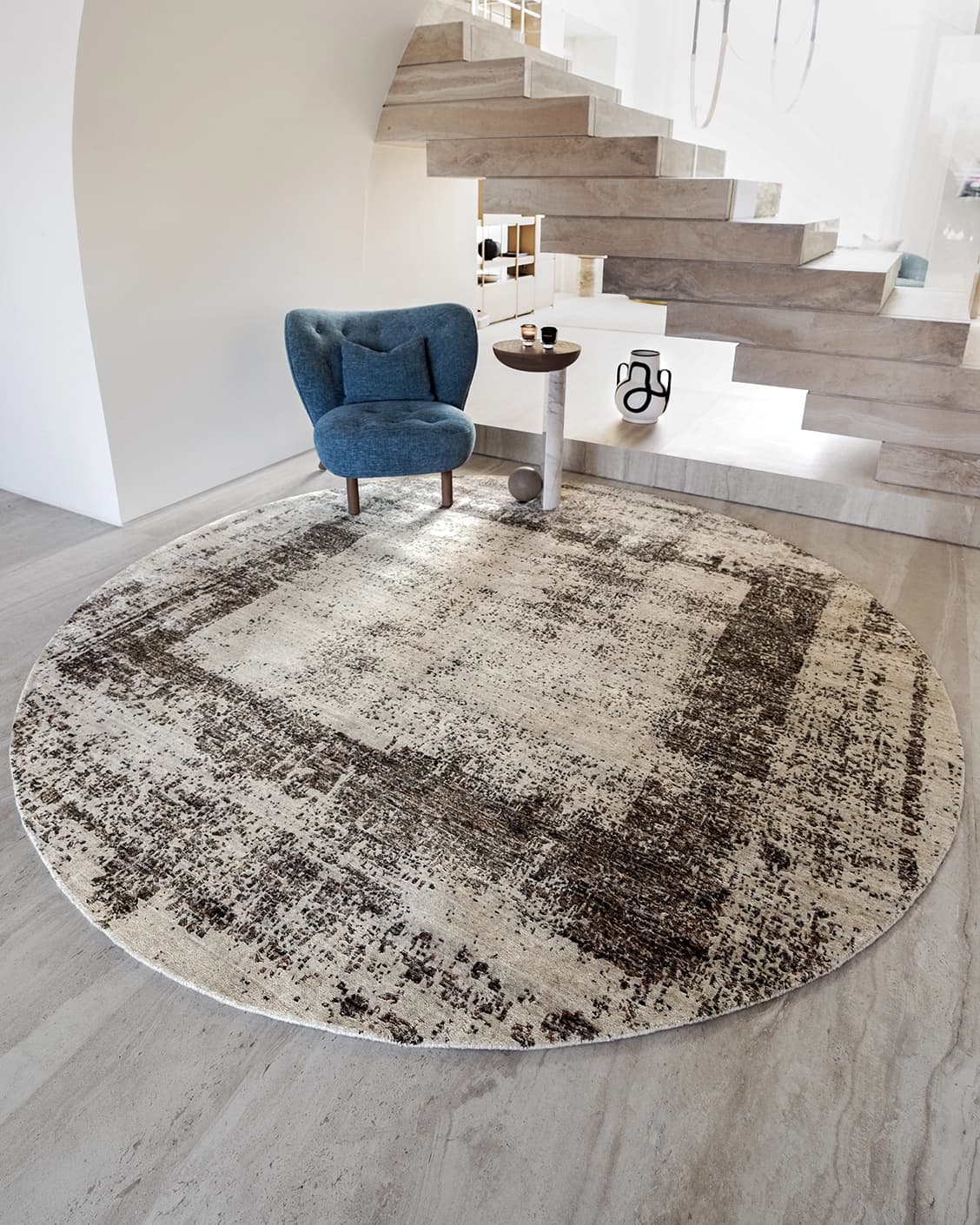 Liam Amber Round carpet in beige, shown in a lifestyle front view as image 2