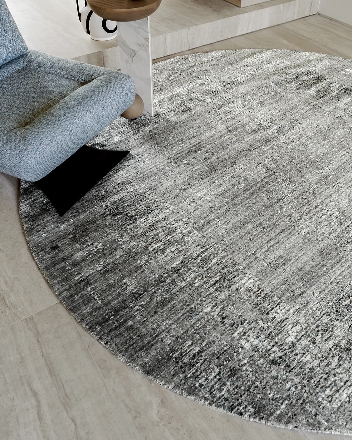 Liam Ashton carpets in grey, shown in a lifestyle close-up top view as image 1