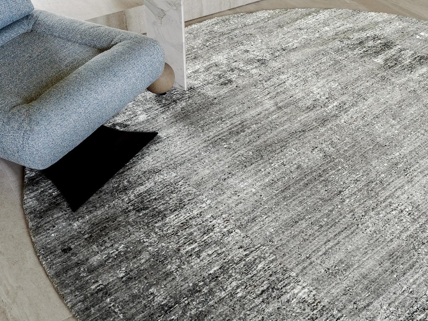 Liam Ashton carpets in grey, shown in a lifestyle close-up top view as image 1