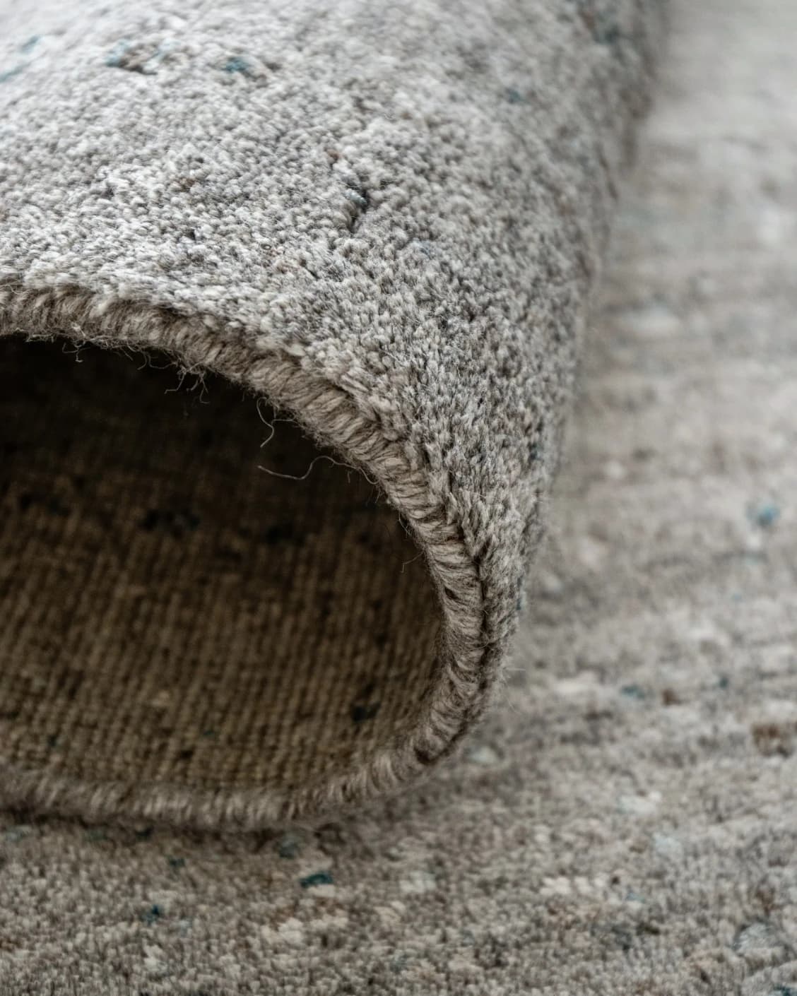 Liam Ashton carpet in grey, shown in a product close-up as image 10
