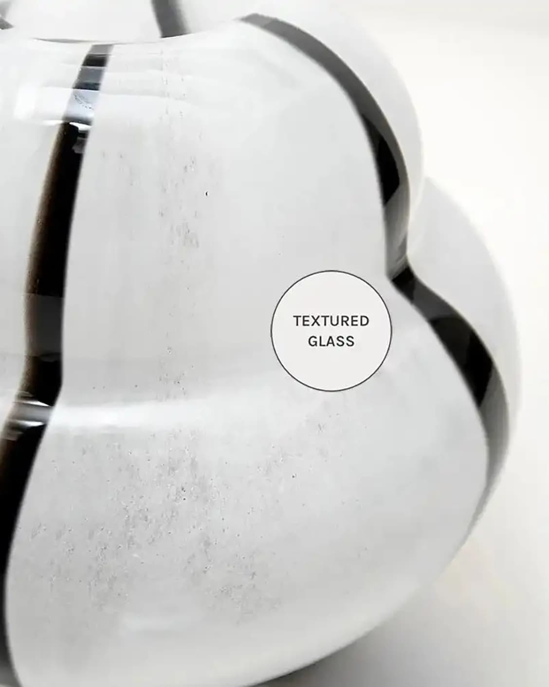Linea Storms vases in black and ivory, shown in a product close-up as image 10