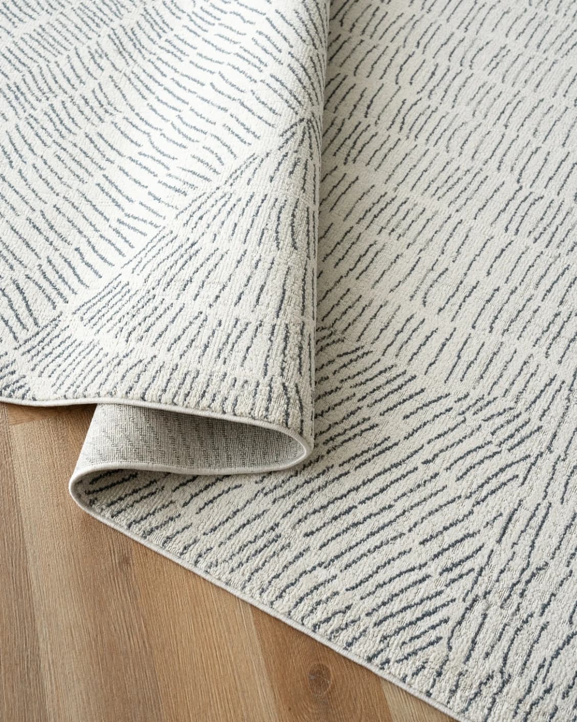 Link Fume carpet in grey, shown in a product close-up as image 11