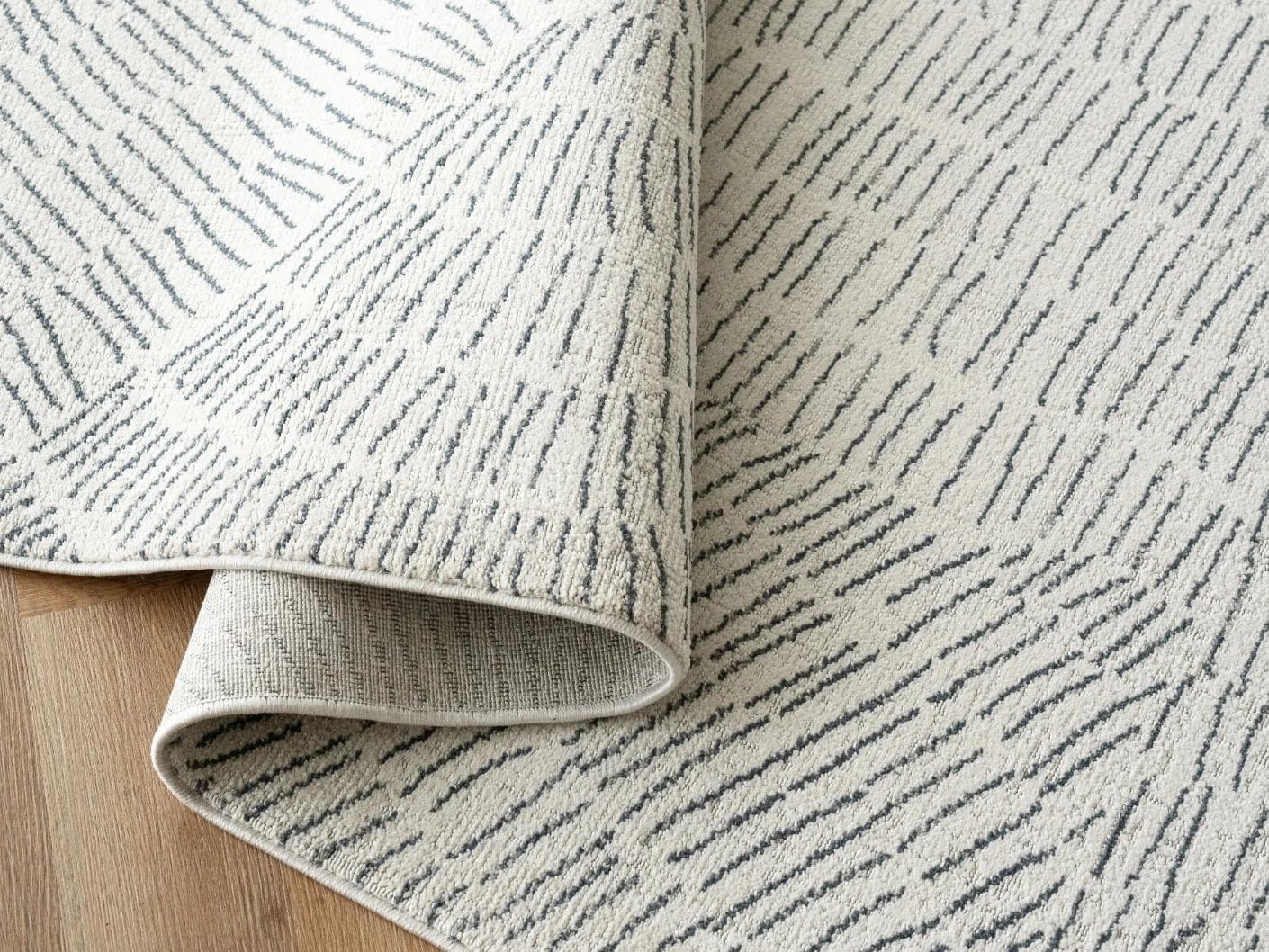 Link Fume carpet in grey, shown in a product close-up as image 11