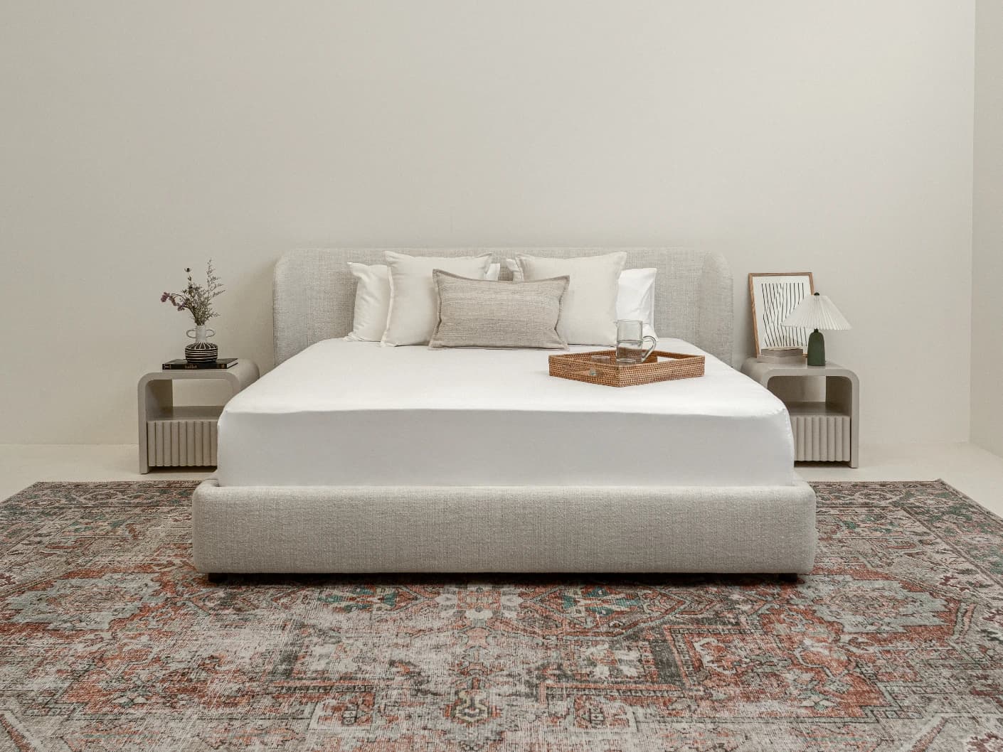 Livia Soft Off-White bed frame in off white, shown in a lifestyle front view