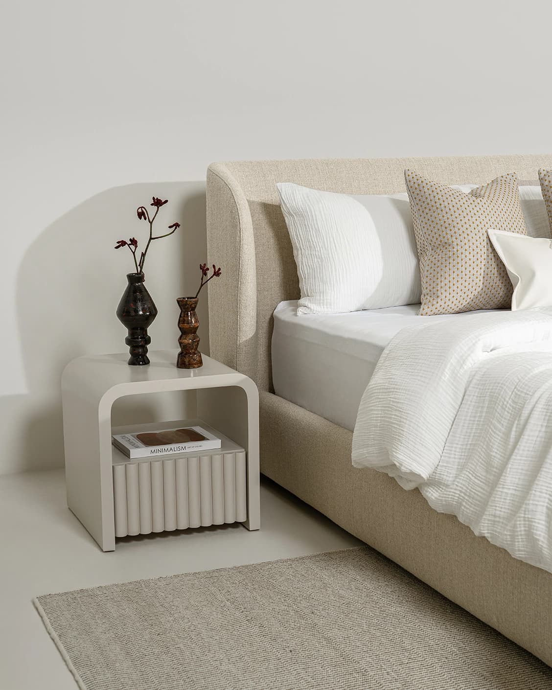 Livia Warm Mushroom bed frame, shown in a lifestyle left view as image 5