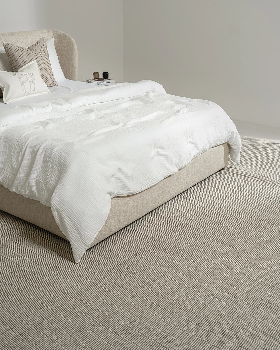 Livia Warm Mushroom bed frame, shown in a lifestyle top view as image video image
