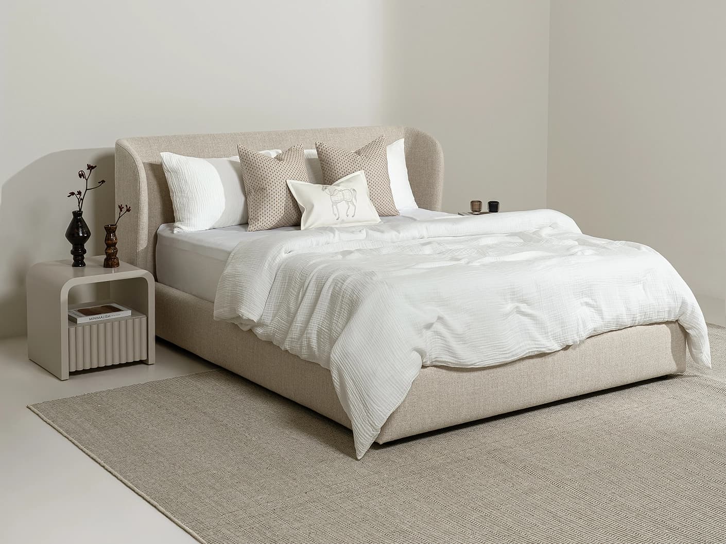 Livia Warm Mushroom bed frame, shown in a product left view as image 4