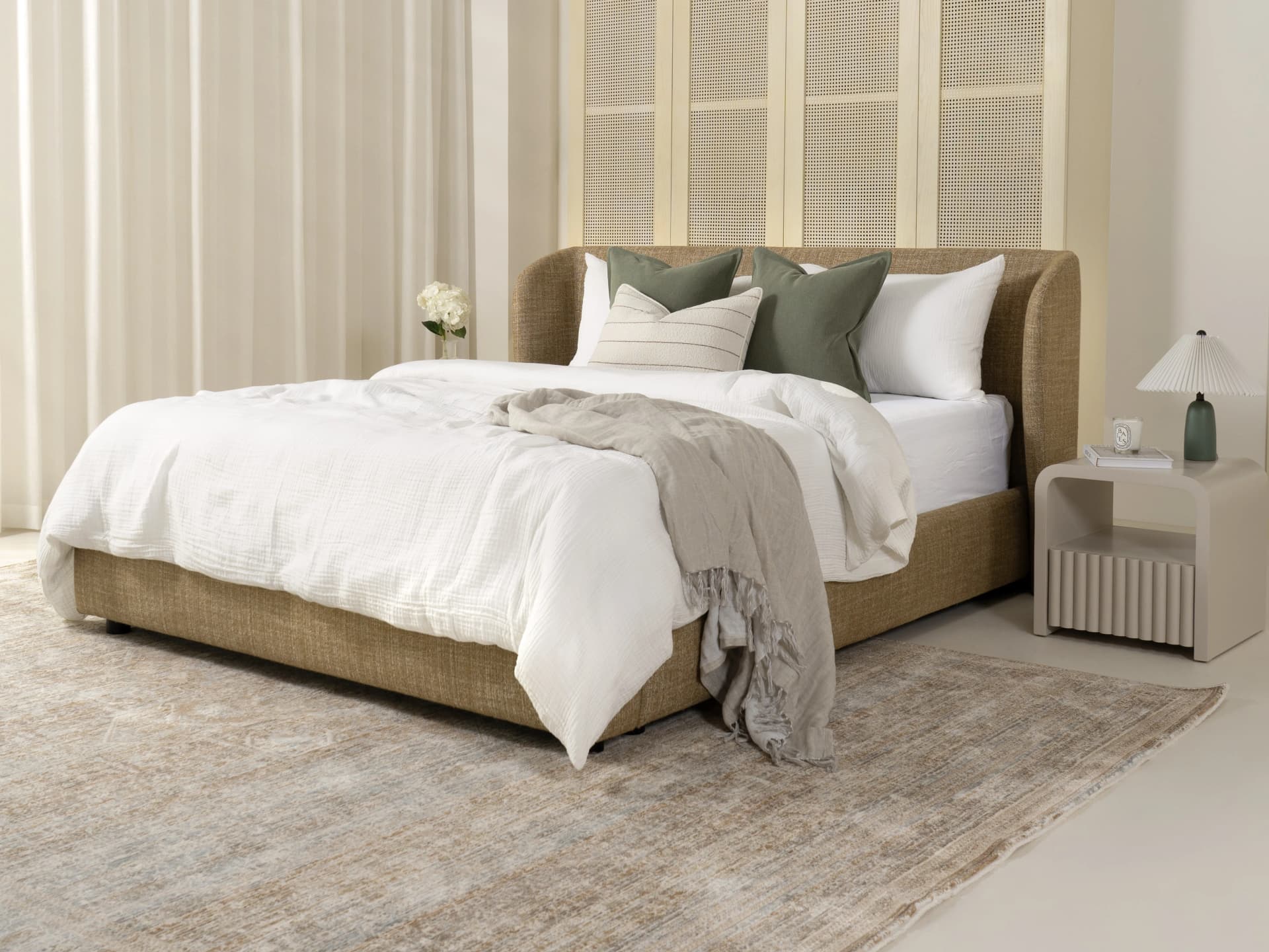 Livia Ochre Brown bed frame in ochre brown, shown in a lifestyle right view